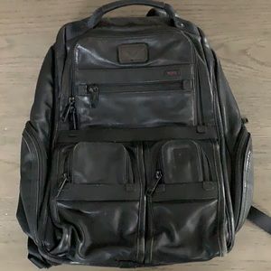 Tumi black leather backpack